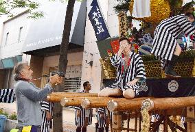 Brazilian pictures float at end of Hakata festival in western Japan