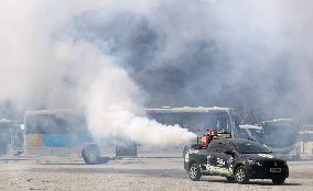 Vehicle spraying massive insecticides