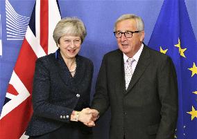 British PM May, European Commission President Junker