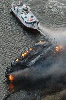 Houseboat in flames in Tokyo