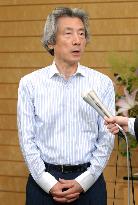 Koizumi repeats no intent to axe Fukui