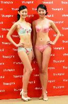 Triumph unveils promotional girls for 2016