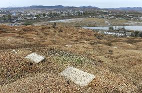N. Korea opens Japanese burial site to Kyodo News