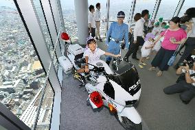 Traffic safety training held at Japan's tallest building