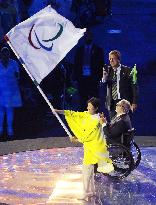 Tokyo Gov. Koike waves Paralympic flag at closing ceremony