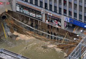 Huge sinkhole near major train station disrupts Fukuoka