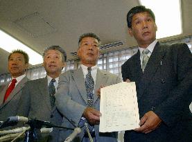TV Asahi settles suit filed by farmers over 1999 dioxin report