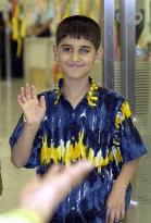Iraqi boy arrives in Japan for medical checkup