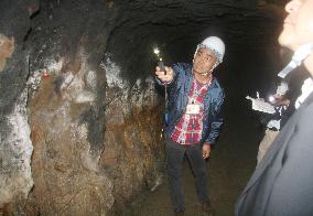 Guided tour inside Okinawa WWII army hospital cave