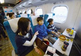Family enjoys ride on Tokaido Shinkansen train running at 285 km/h