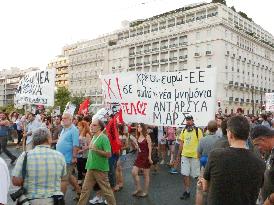 Greeks demonstrate against austerity measures