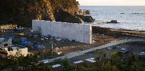 Giant coastal levee in response to quake-tsunami in Japan