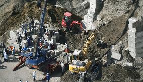 Two workers buried in landslide at quarry in western Japan