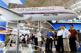 Model of China's 1st commercial jet debuts at Beijing air show