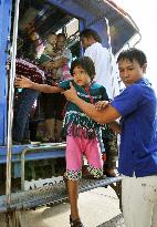 Myanmar refugees on way to Japan