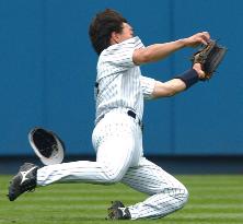 Matsui dives for catch