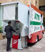 Seven Bank unveils "mobile ATM" for disaster-hit areas