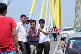 New Japan-funded bridge over Mekong is magnet for tourists