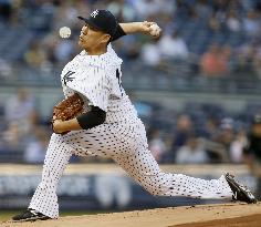 Tanaka earns 4th win in game against Nationals