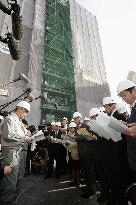 Lawmakers check condo building site