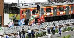 Tsunami-hit local train line resumes full operation in north Japan