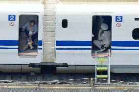 Shinkansen bullet train makes emergency stop due to smoke