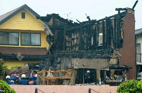 Father nabbed over deadly fire blames wife for not seeing him off