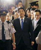 Japan ruling camp rams security bills through lower house panel