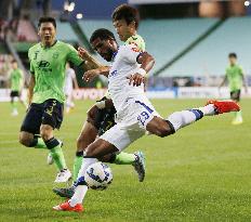 Gamba forward Patrick in action during ACL q'final game