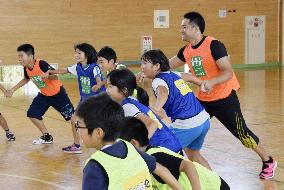 Ex-Japan rugby captain visits north Japan school on outreach program