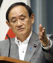 Suga unhappy with Okinawa governor's U.N. speech