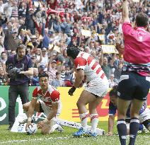 Japan's Yamada scores try against Samoa