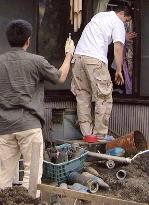 (2)Man arrested over explosion at parcel delivery firm