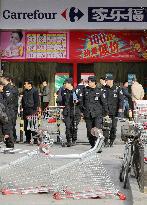Police heighten security amid bomb threat in Beijing
