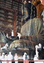 Great Buddha of Nara cleaned by monks