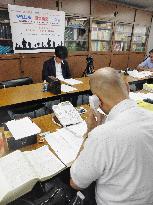 Lawyer advises anxious family members of Japanese troops
