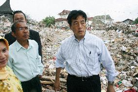 Okada inspects earthquake damage in Indonesia