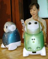 NEC, NTT develop robot helping parents monitor kids at remote si