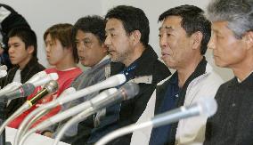(4)2 freed crewmembers, colleagues return to Japan