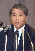 Tax-panel chief to resign over scandal, deals blow to Abe