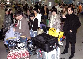 New Year holiday-makers pack Kansai airport