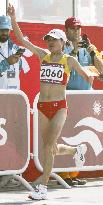 China's Zhou blows away field to claim marathon gold