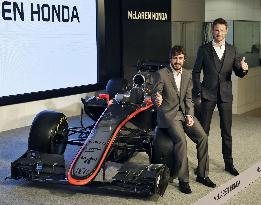 McLaren-Honda drivers pose beside F1 cars in Tokyo