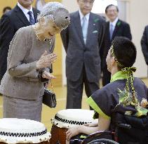 Japanese Empress Michiko talks to student in sign language