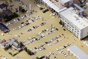 Parking lot, office building flooded in eastern Japan city