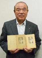 Japanese man seeks to return WWII navy soldiers' photos to kin