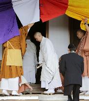 Buddhist priest enters hall for 9-day fasting