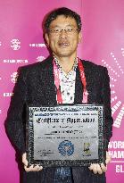 Japanese gymnastics expert honored for his illustrations