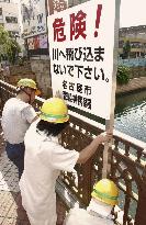 Hanshin fans warned about diving into river