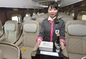 Train attendant for luxury seats of Hokuriku Shinkansen